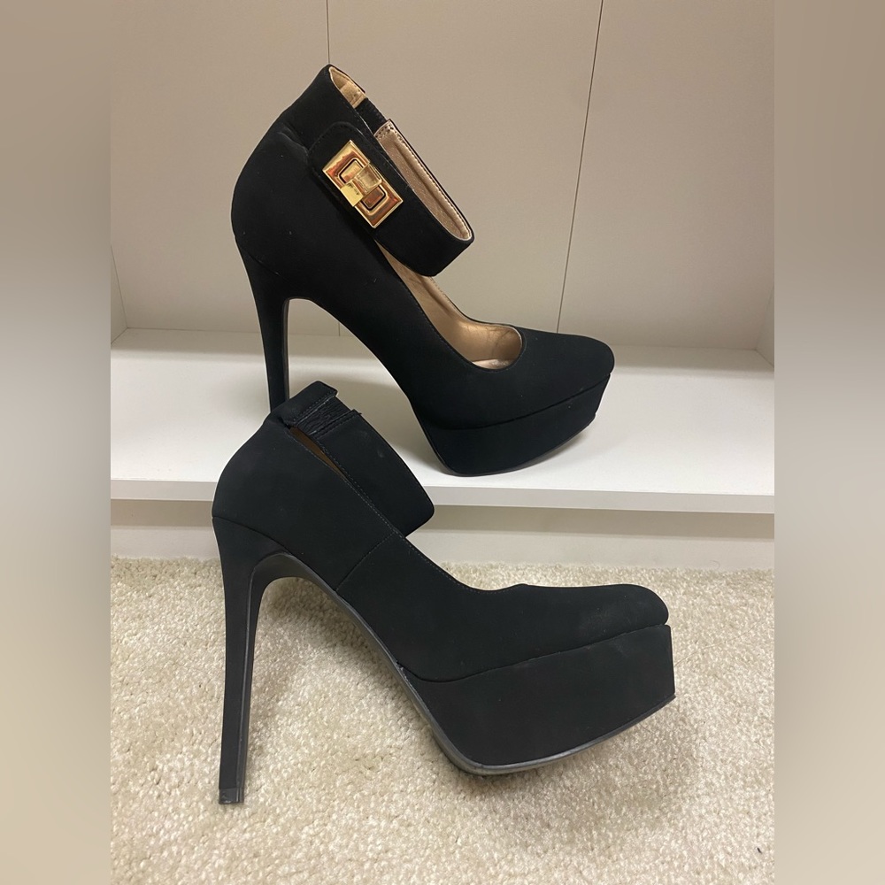 Charlotte Russe black platform heels with ankle straps with gold lock.